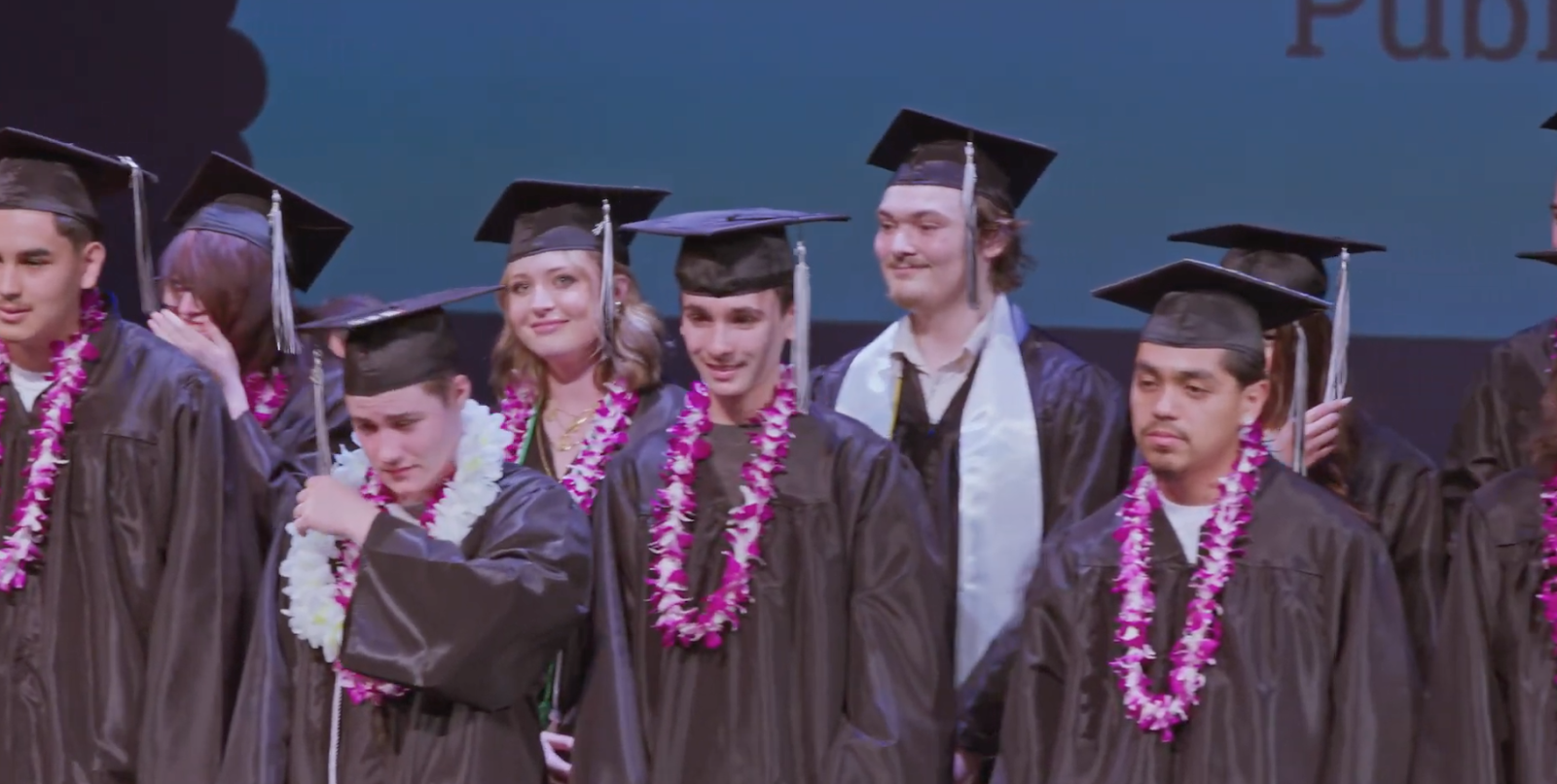 Zayne with his fellow graduates, reflecting on their shared journey and the challenges they had overcome together.