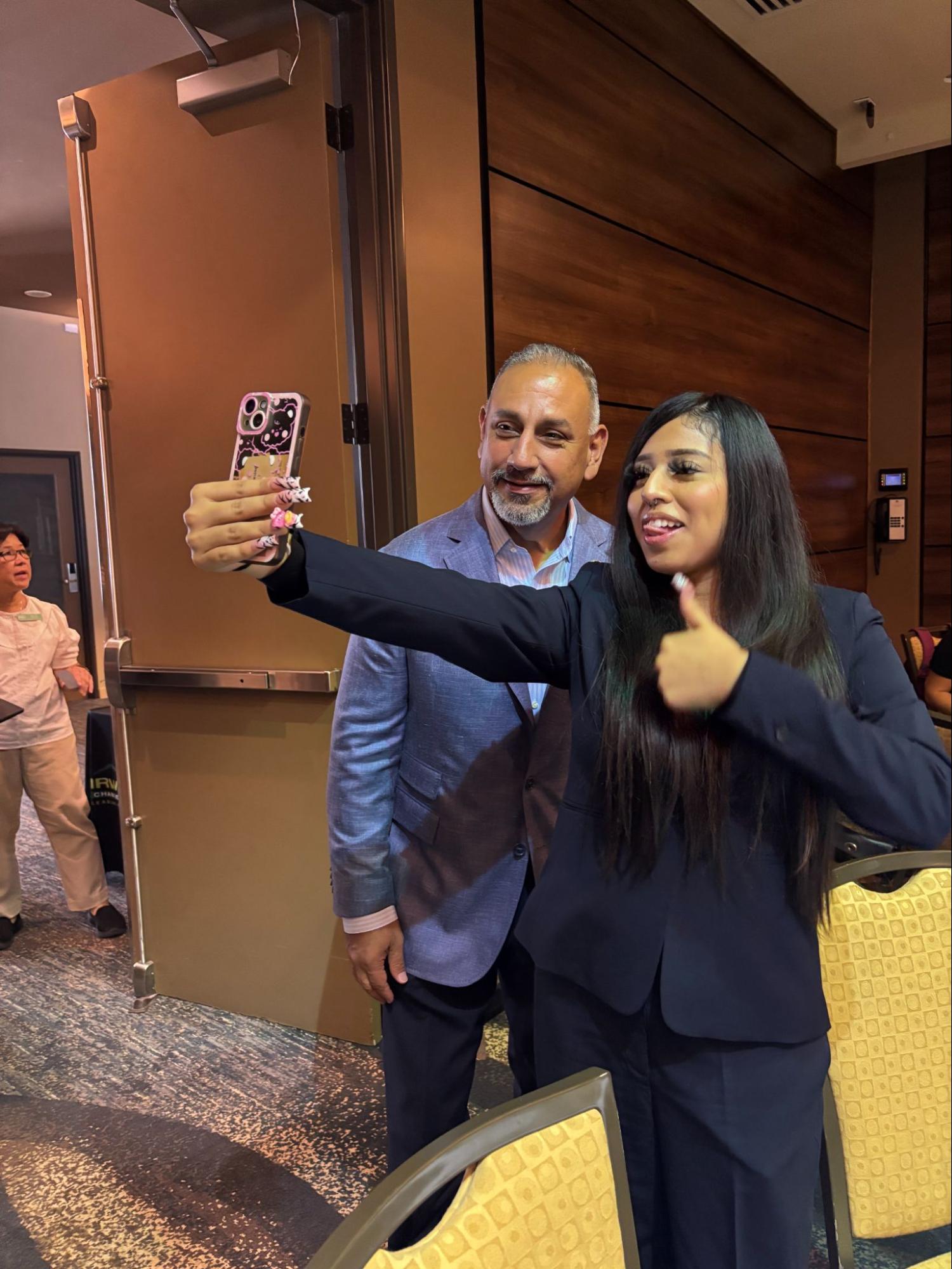 OFL Baldwin Park senior Atziri Talavera records a video message with Congressman Gil Cisneros, declaring, “We are fighting for you!”
