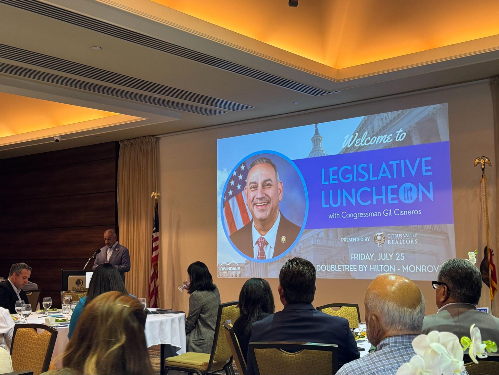 Congressman Gil Cisneros delivering his keynote address.